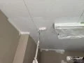 ガレージ天井塗装の様子 ビルドインガレージのお住まいの天井も塗装しました[ガレージ天井_下塗り]